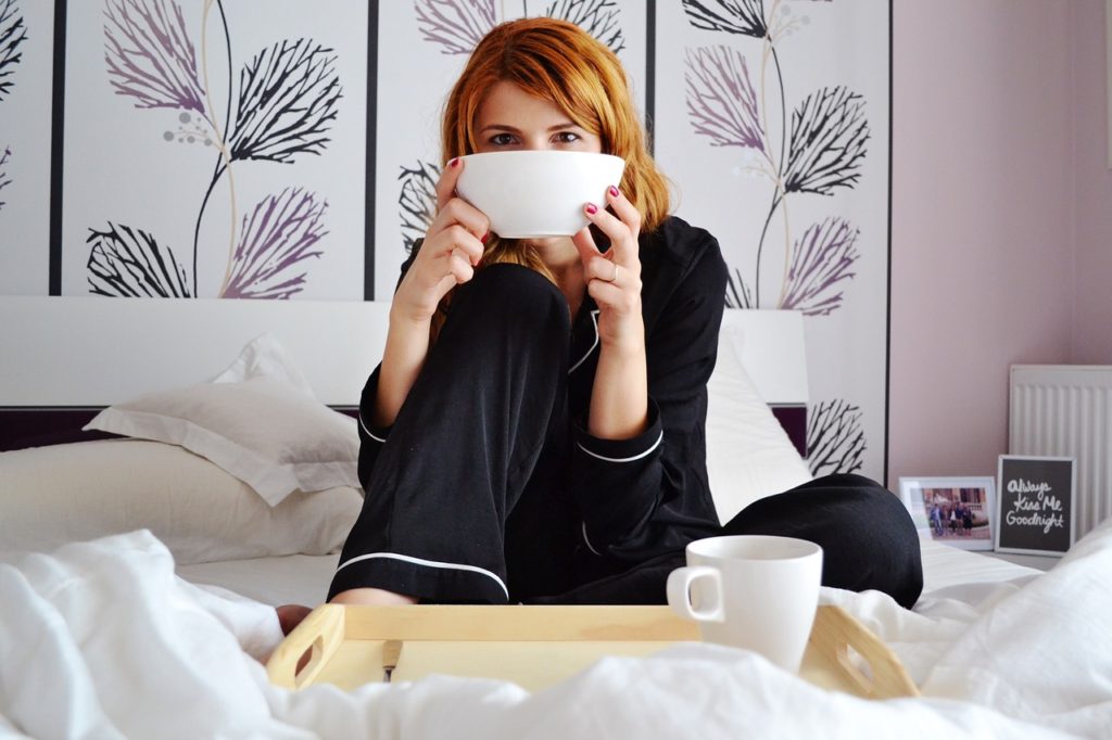 girl-in-bed-breakfast-in-bed-girl-with-cereal-bowl-2004771-1024x682